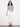 White cropped jeans boasting a trendy fringed hem detail, ideal for elevating any casual look by Charlie B.