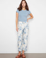 Floral pants in a stretch linen blend, showcasing their comfortable wide leg design. A perfect addition to your wardrobe by Charlie B.