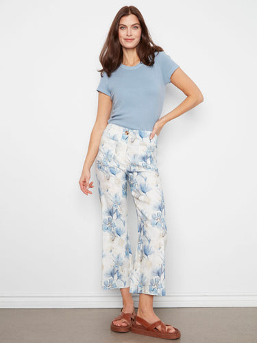 These cropped length floral trousers are designed to elevate your everyday style with ease and sophistication by Charlie B.