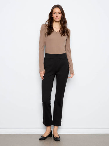 Ankle-length black ponte pants with a regular rise and rolled cuffs, offering a sleek straight leg design by Charlie B.