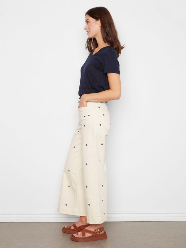 The cropped length of these pants offers a modern and chic look for versatile styling. By Charlie B.