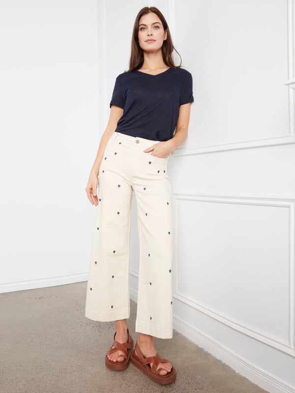 Embroidered hearts add a playful detail to these stylishly crafted pants by Charlie B.