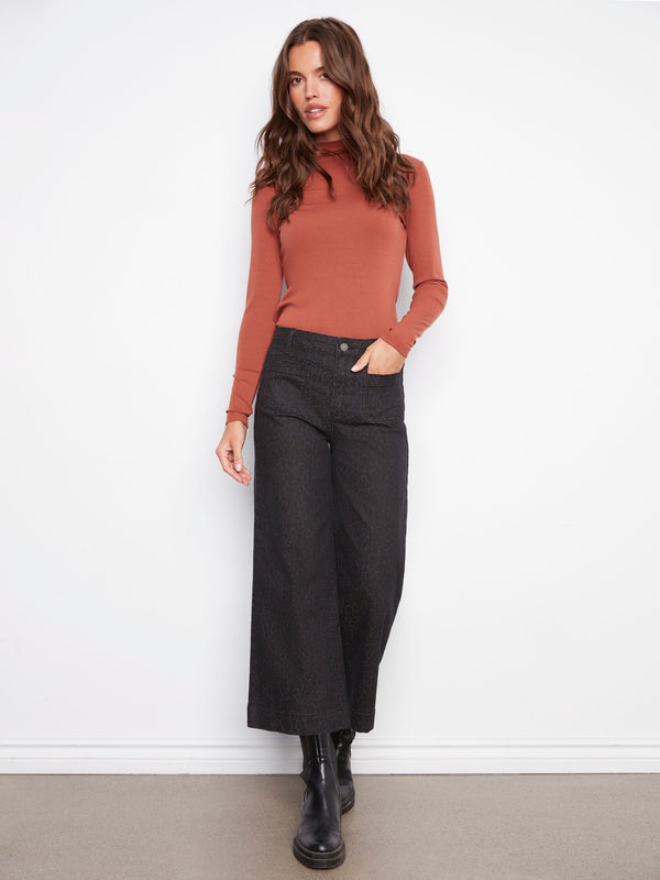 Leopard print pants featuring a stylish flare fit, perfect for adding flair to any outfit by Charlie B.