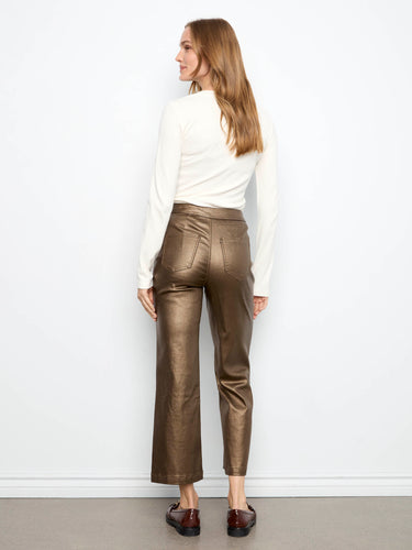 Crafted from stretch metallic twill, these pants offer comfort without sacrificing style. By Charlie B.