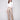 Brass metallic wax pants with a stylish flare fit adding elegance to any outfit by Charlie B.