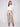 Brass metallic wax pants with a stylish flare fit adding elegance to any outfit by Charlie B.