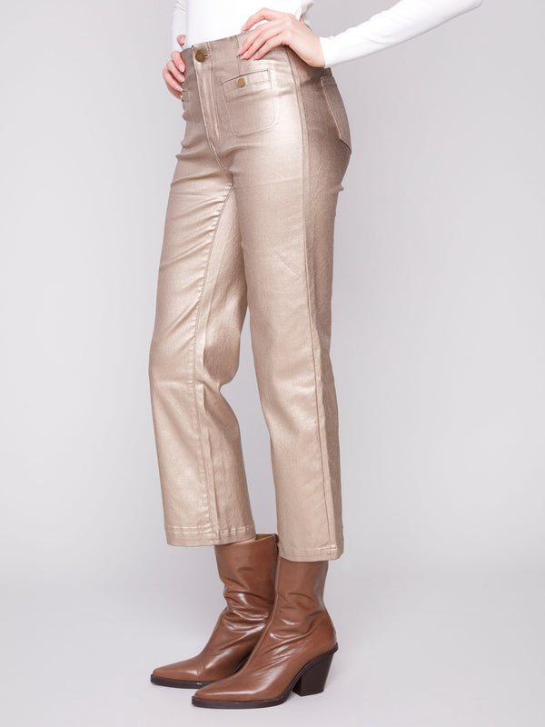 Crafted in cropped length, these metallic pants offer a trendy and fresh style by Charlie B.