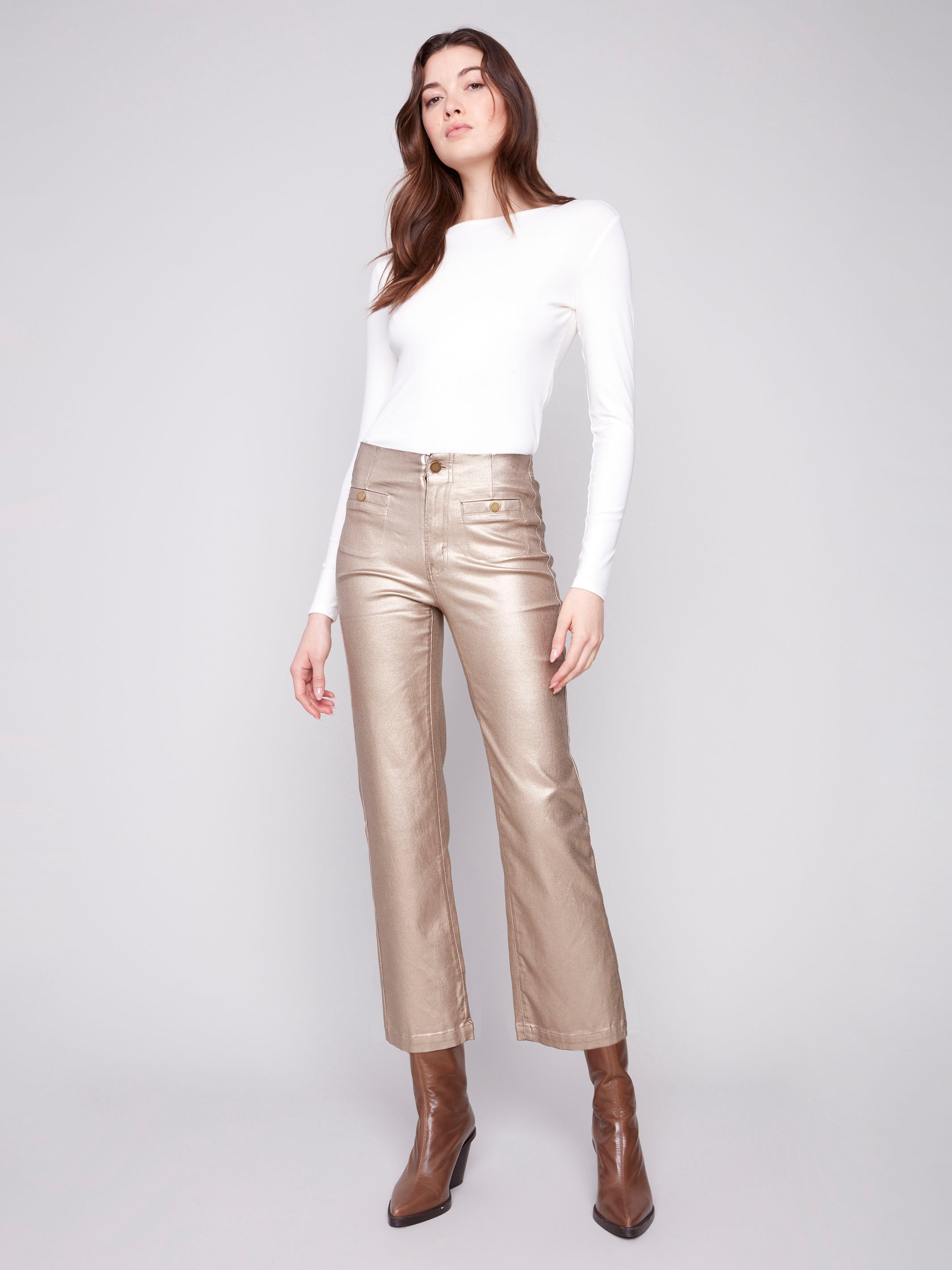 Designed with stretch fabric, these brass pants ensure comfort without compromising style by Charlie B.