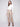 Designed with stretch fabric, these brass pants ensure comfort without compromising style by Charlie B.