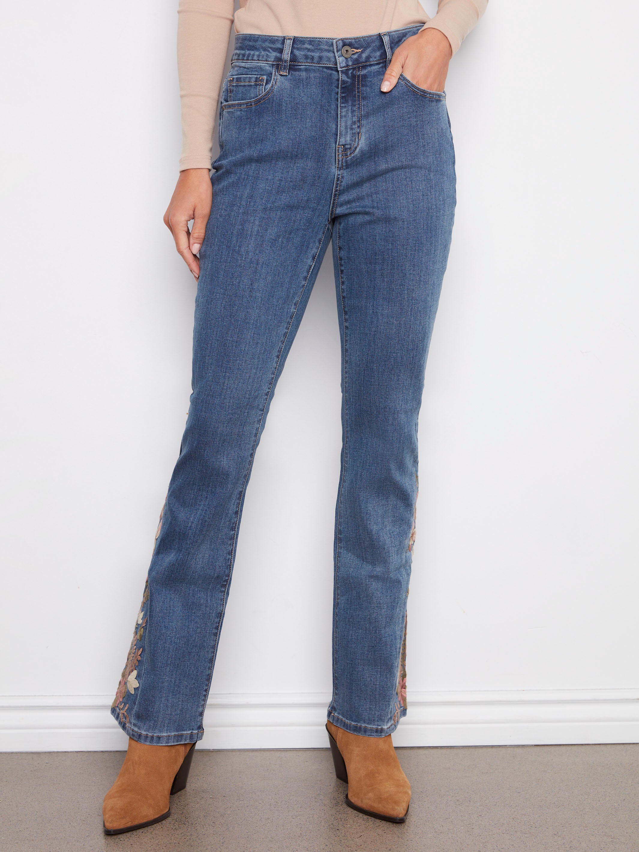 These stylish jeans offer a classic five-pocket design and long length, perfect for any occasion by Charlie B.
