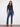 Indigo jeans with a bootcut fit and regular rise, featuring intricate floral embroidery for a stylish touch by Charlie B.