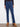 These indigo jeans have a five-pocket design and stretch denim for comfort, enhanced with floral side details by Charlie B.