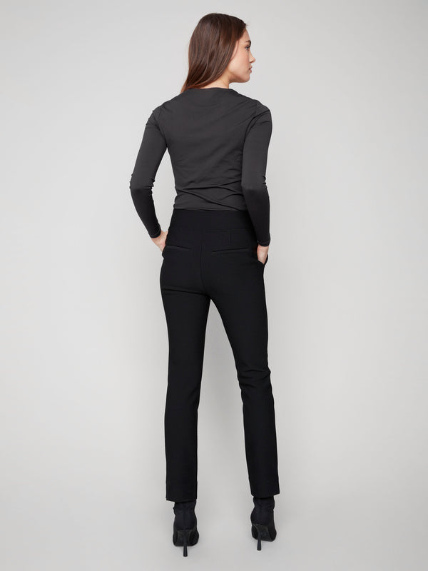 Sophisticated black slim-fit dress pants equipped with two back welt pockets, perfect for adding polish to your ensemble by Charlie B.