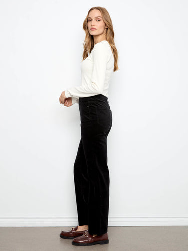 Enjoy the comfort of a hidden elastic waistband that ensures a snug fit while maintaining style. By Charlie B.