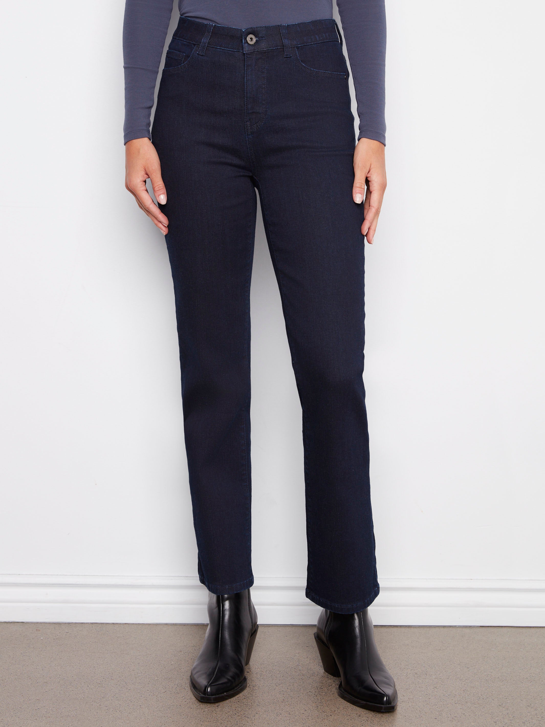 These jeans offer an elastic inside waistband for added comfort, paired with a classic button closure and regular rise by Charlie B.