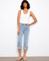 Stylish slim fit jeans with a cropped length and five-pocket design, perfect for casual outings. By Charlie B.