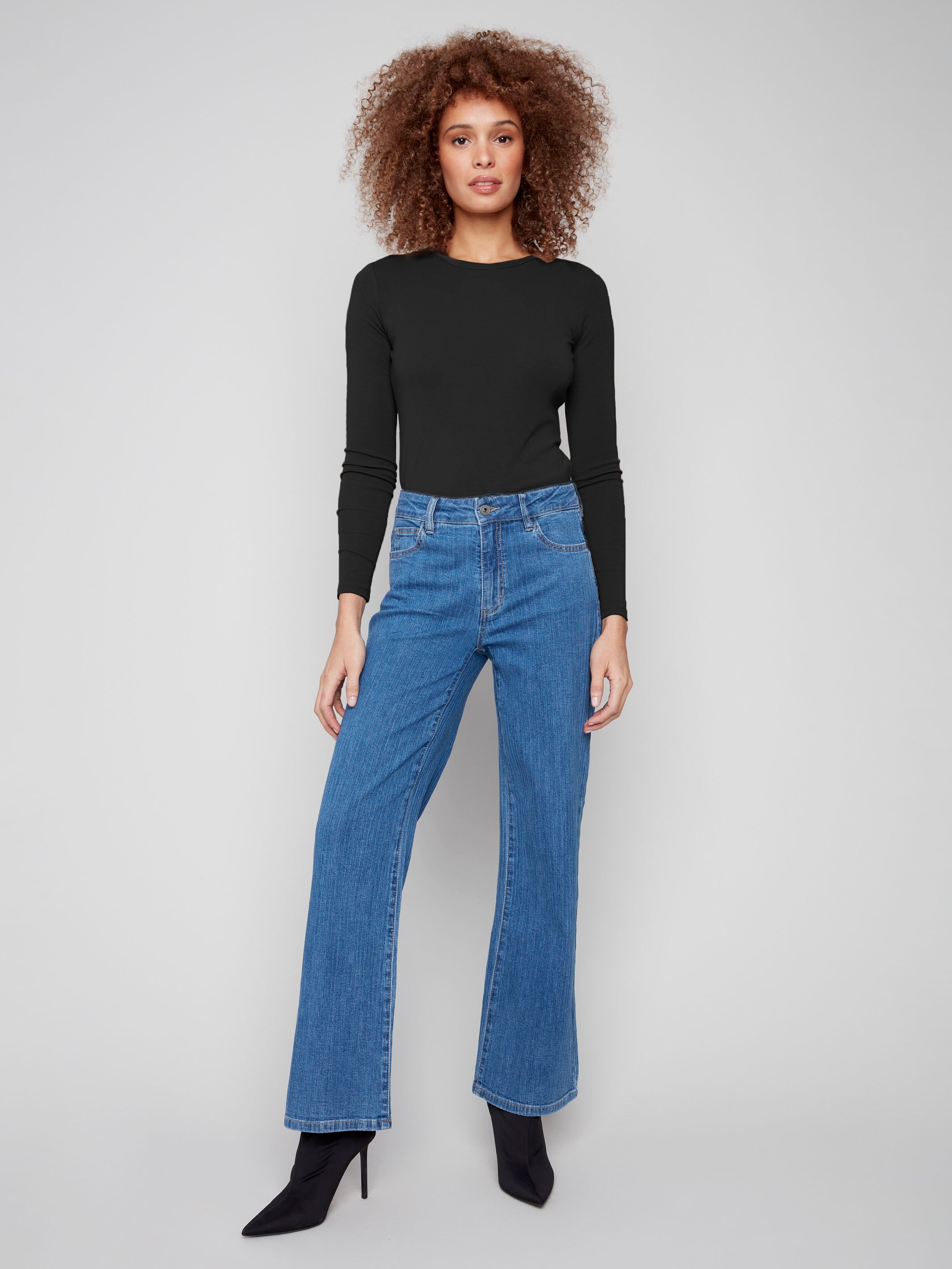 Blue wide-leg jeans in stretch corduroy denim with a stylish striped pattern by Charlie B.