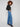 Long length blue jeans featuring a classic five-pocket design and striped pattern by Charlie B.