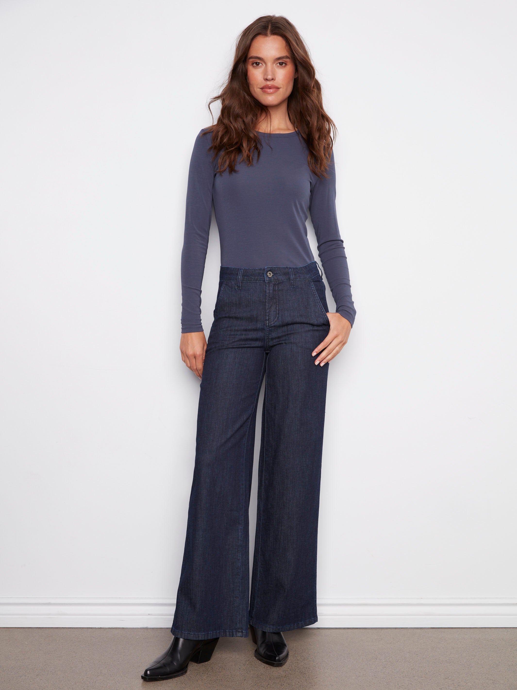 These jeans feature a long length design, perfect for pairing with boots or heels by Charlie B.