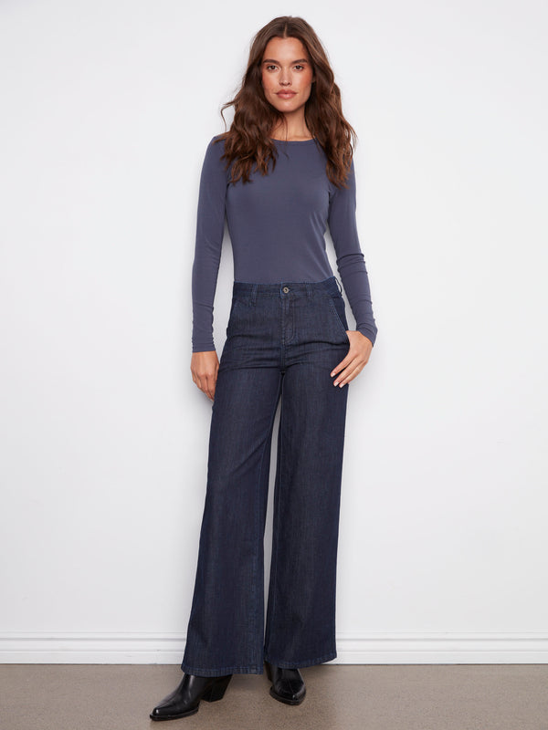These jeans feature a long length design, perfect for pairing with boots or heels by Charlie B.