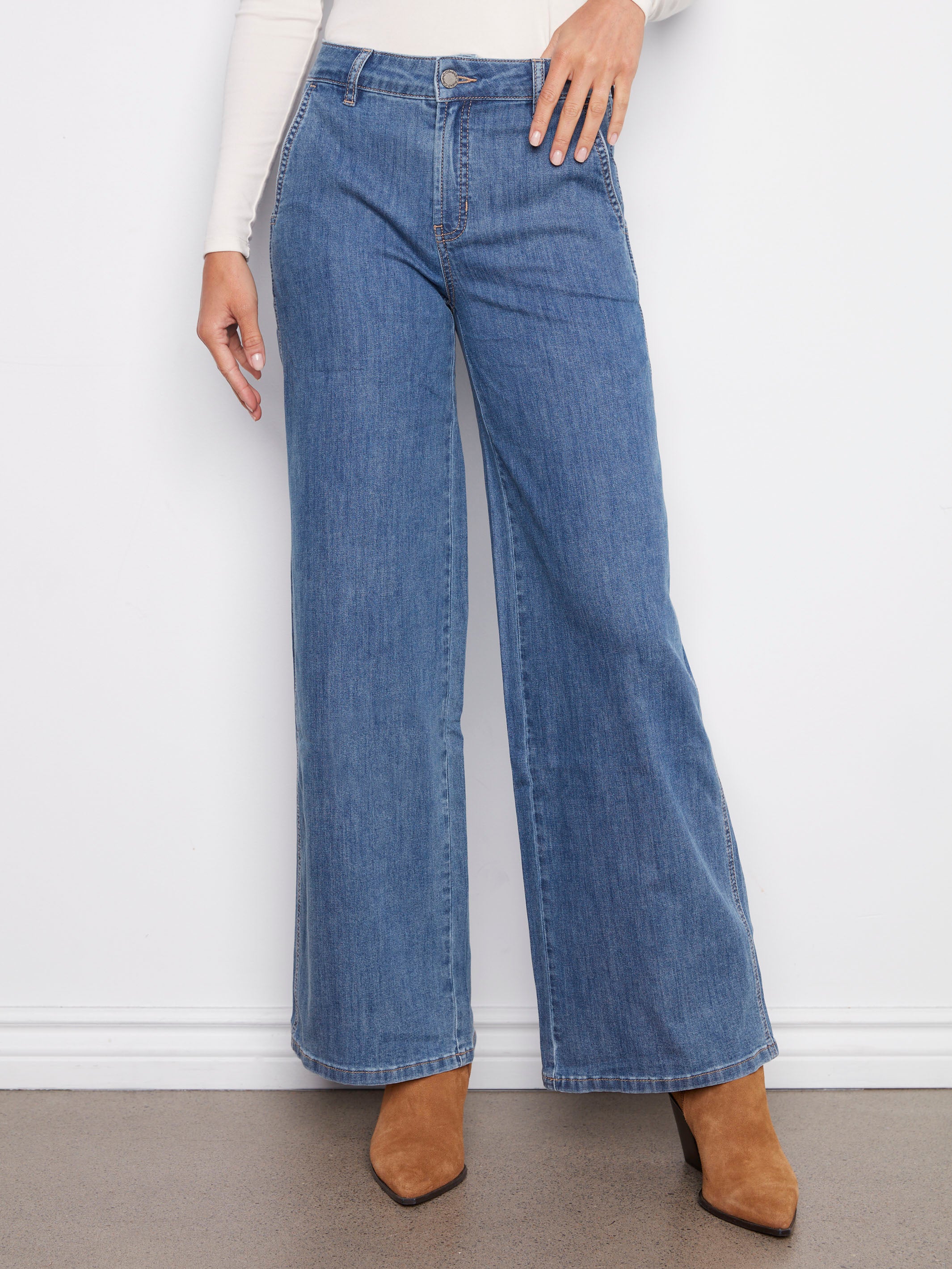 Stylish blue jeans with slash pockets and a regular rise, offering an elegant yet casual look by Charlie B.