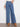 Stylish blue jeans with slash pockets and a regular rise, offering an elegant yet casual look by Charlie B.