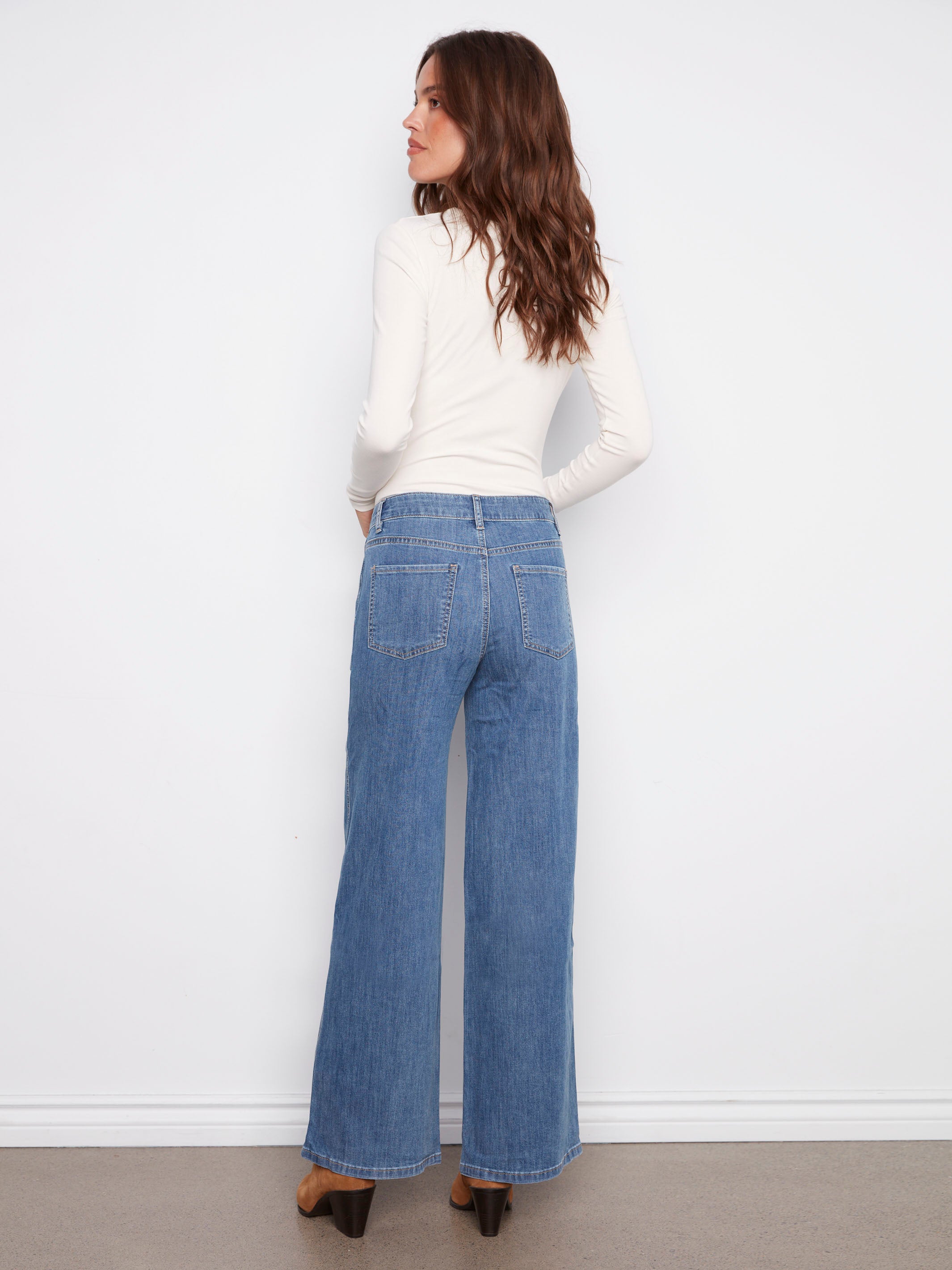 Elegant blue jeans showcasing long length and regular rise, perfect for any occasion by Charlie B.