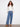 Chic wide-leg blue jeans with button front closure, ideal for versatile styling options by Charlie B.