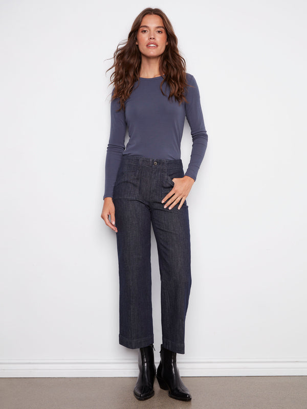 Deep blue jeans with a flattering cropped length, designed for modern style and comfort by Charlie B.