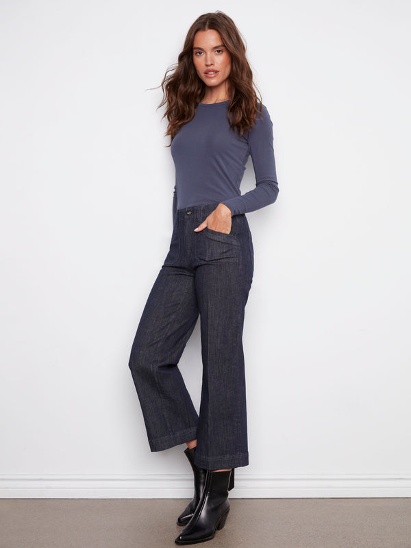 Crafted from stretch denim fabric, these deep blue jeans ensure all-day comfort and style by Charlie B.