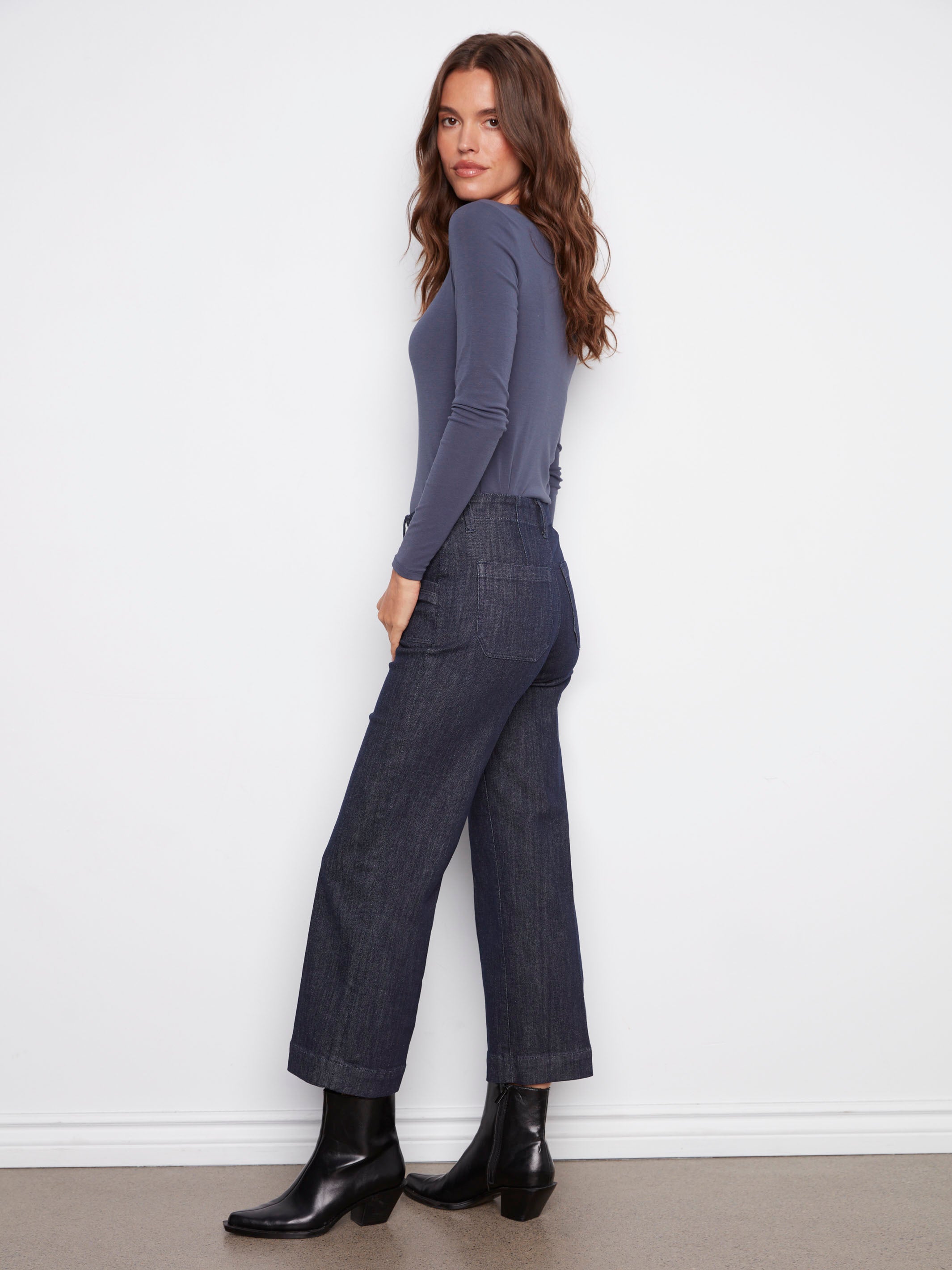 These jeans come with rectangular front patch pockets, adding a touch of practicality to fashion by Charlie B.