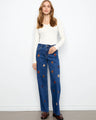 These jeans feature a wide fit and charming flower embroidery, perfect for a relaxed yet stylish look by Charlie B.