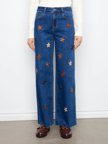 Crafted with suede patches, these jeans offer a unique texture and design element that stands out by Charlie B.