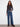 Indigo jeans featuring a regular rise and charming flower patches, offering a stylish look by Charlie B.