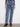 Stretch denim wide leg jeans adorned with colorful flower patches for a playful vibe by Charlie B.