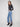 Featuring a classic five-pocket design, these medium blue jeans offer both functionality and fashion-forward style by Charlie B.