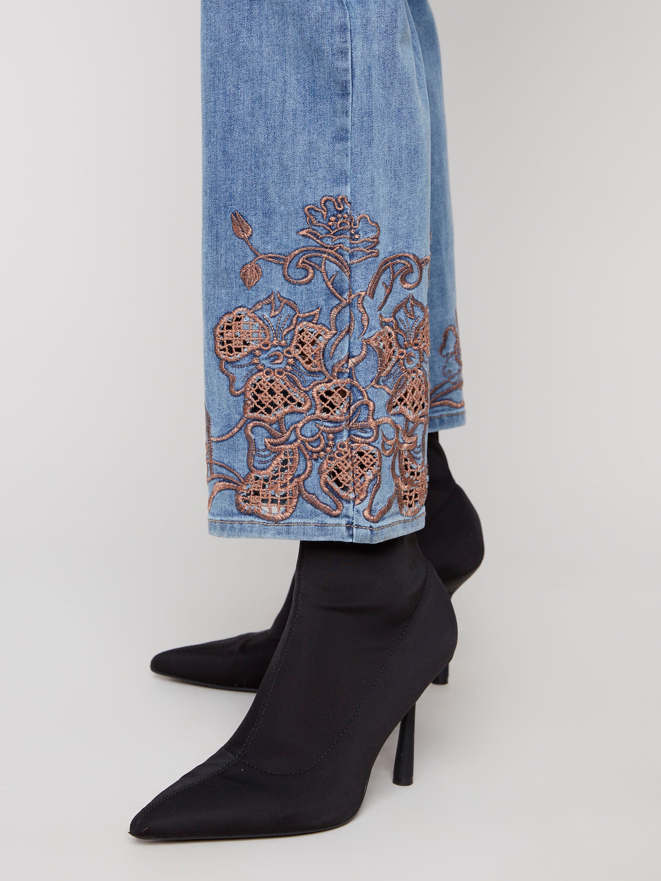 Crafted from stretch denim, these jeans provide comfort and flexibility while maintaining their stylish look by Charlie B.