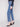 Denim jeans in medium blue with regular rise, highlighted by side stud details and classic style by Charlie B.
