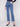 Five-pocket design in these straight-leg medium blue jeans adds practicality to the stylish look by Charlie B.