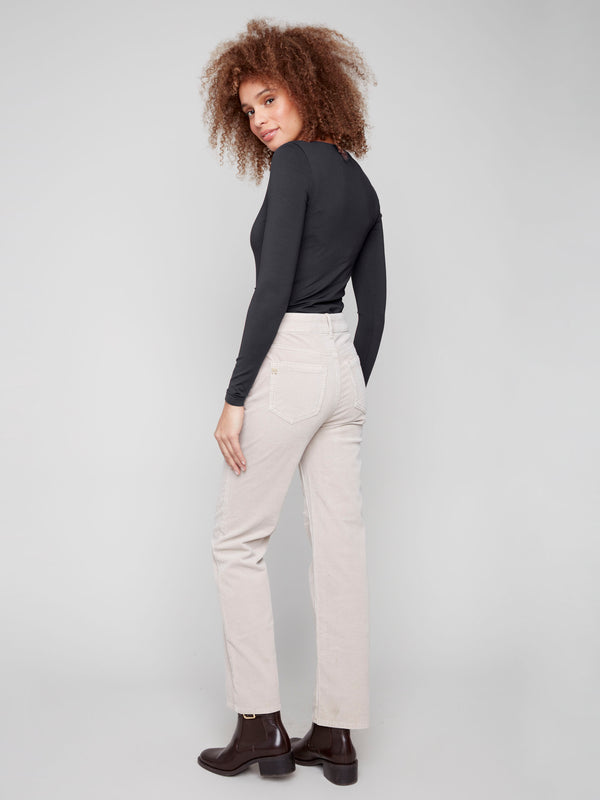 Crafted from stretch corduroy material, these oat pants provide both comfort and chic fashion by Charlie B.