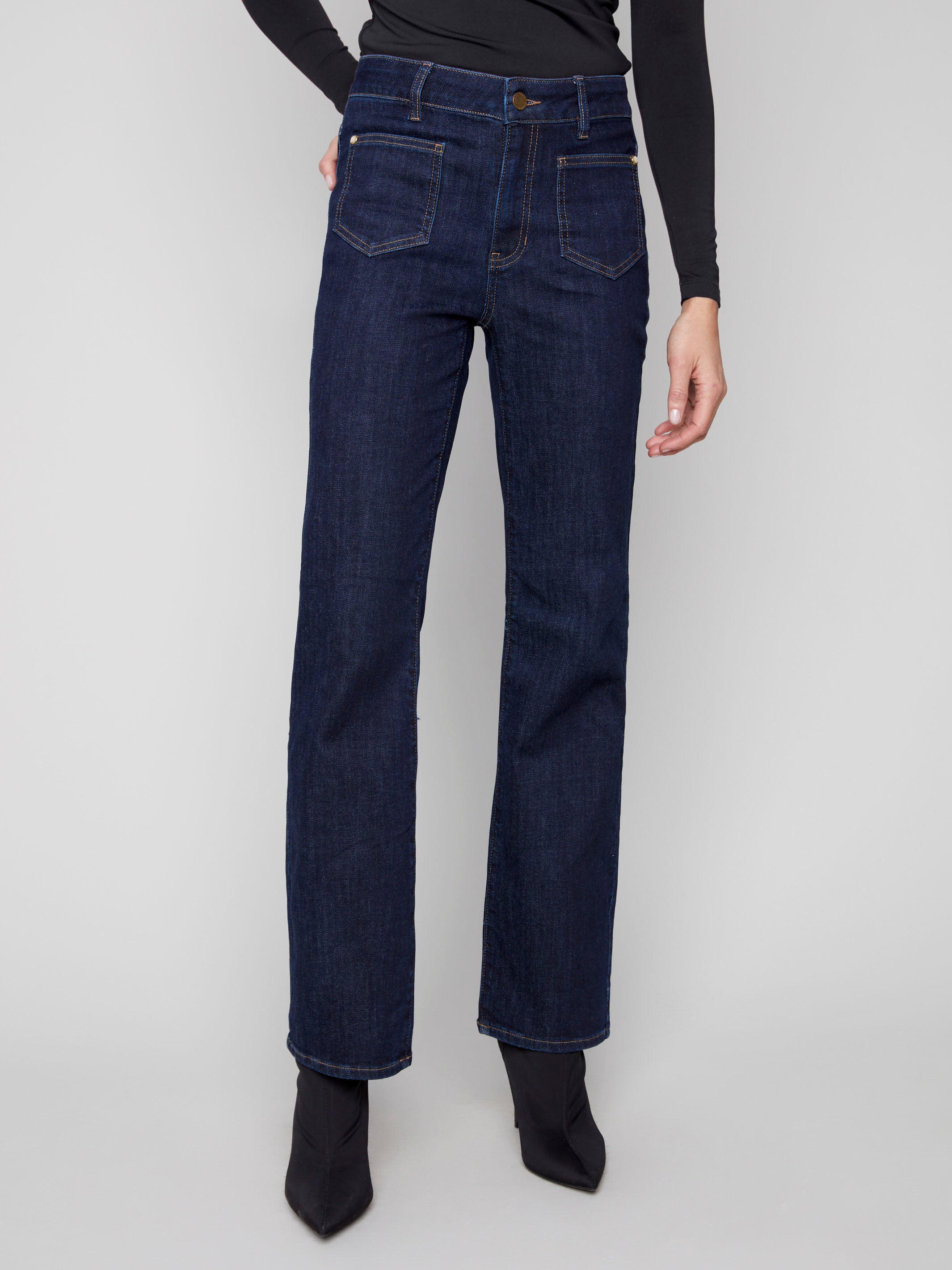 Stylish deep blue jeans with long length and front patch pockets, offering a chic look in stretch denim by Charlie B.