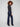 Chic deep blue jeans with front patch pockets and an elongated silhouette, perfect for versatile styling by Charlie B.