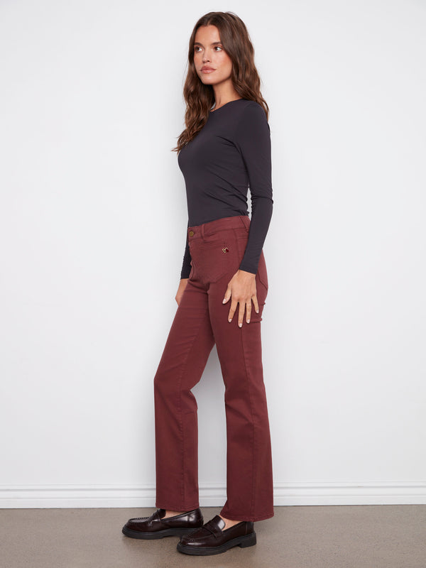 These cabernet pants come with unique front patch pockets and back pockets for added functionality by Charlie B.
