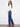Long length indigo jeans with back pockets and flared legs, adding elegance to any outfit by Charlie B.