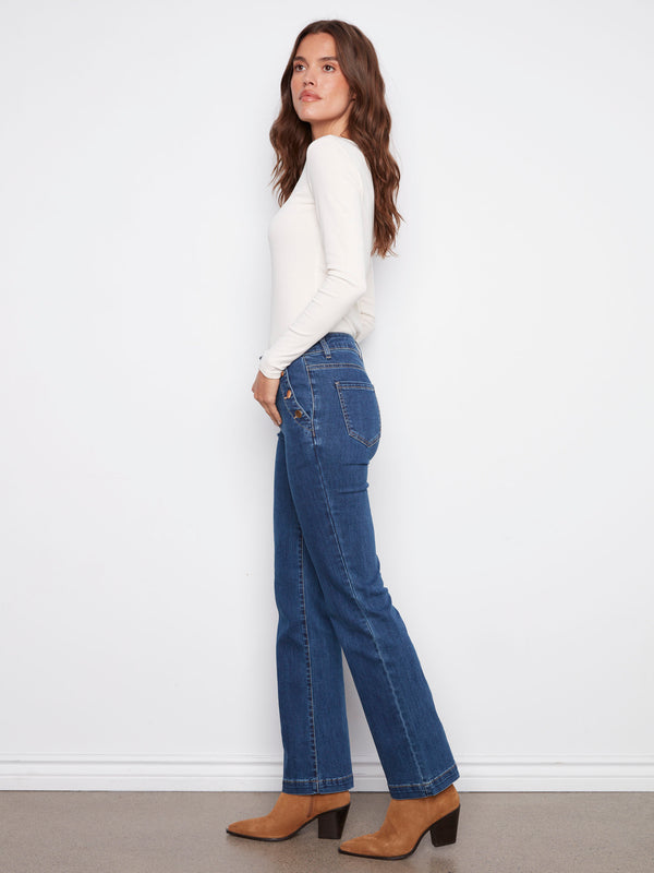 Long length indigo jeans with back pockets and flared legs, adding elegance to any outfit by Charlie B.