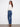 Indigo flare leg jeans showcasing stylish button details on the pockets for an elevated look by Charlie B.
