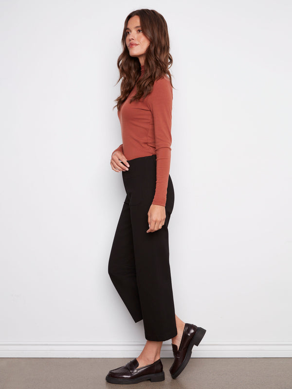 These wide-leg black pants include convenient belt loops for accessorizing by Charlie B.