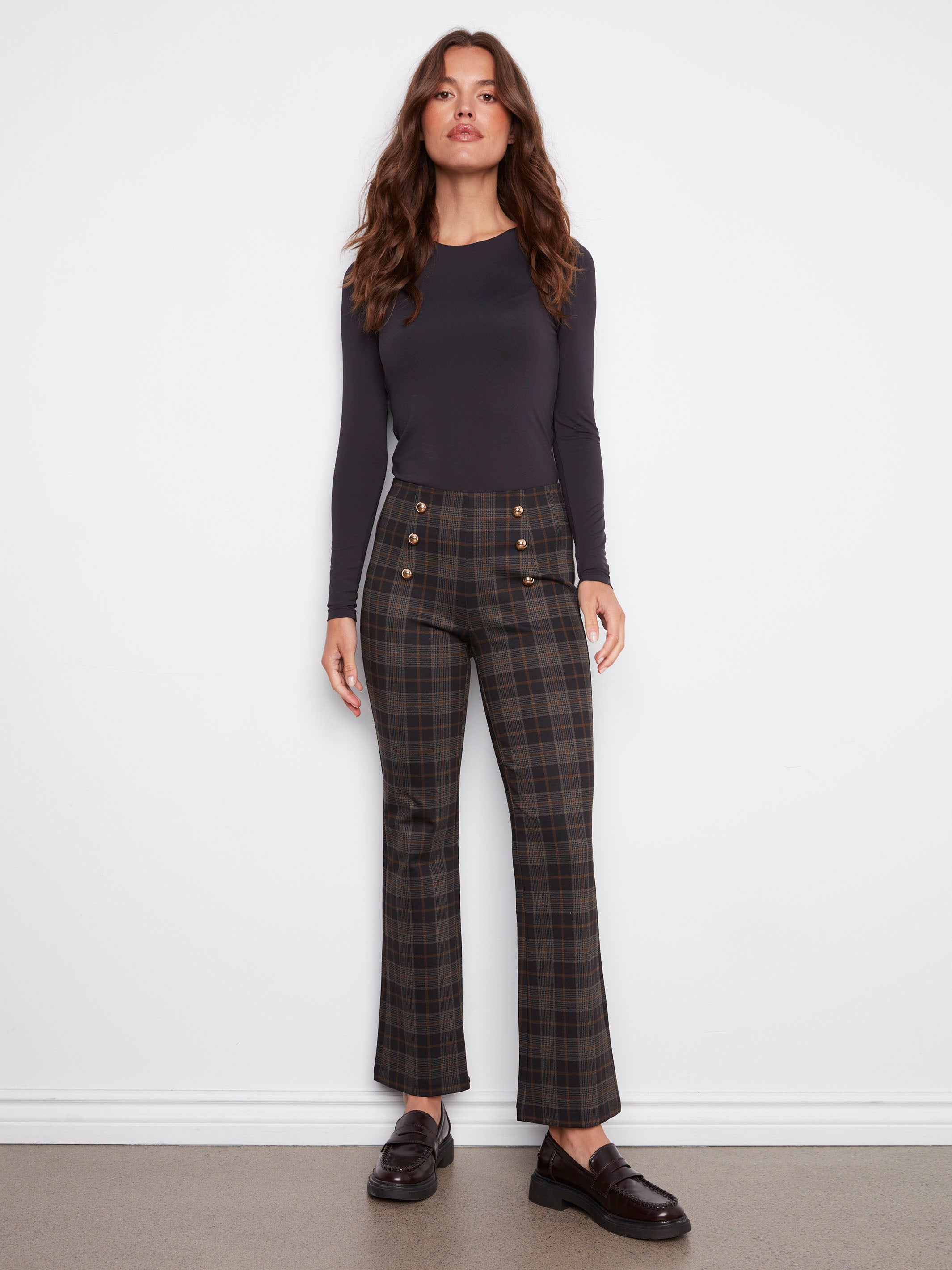 Plaid flare pants with a comfortable elastic waistband, offering a stylish flare fit for versatile wear by Charlie B.