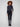Charcoal jeans with a washed frayed hem and flare leg, crafted in stretch denim for comfort by Charlie B.