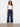 Navy cropped dressy pants with a belted waist and side zipper closure, featuring wide legs by Charlie B.